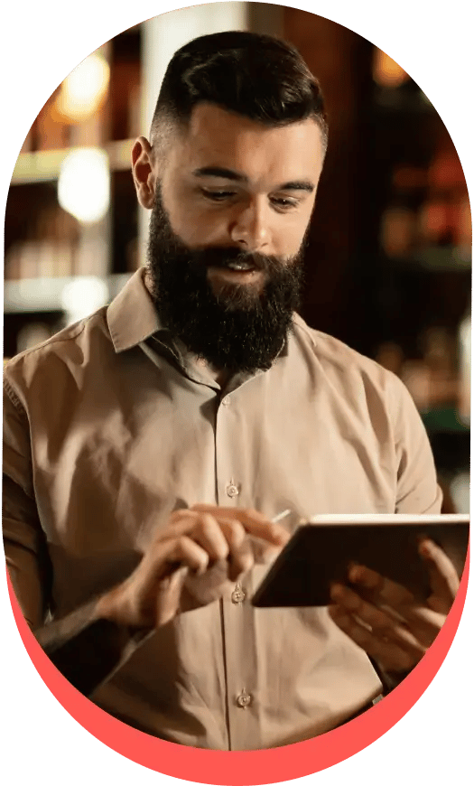 Man using a virtual payment terminal on a tablet to process a transaction