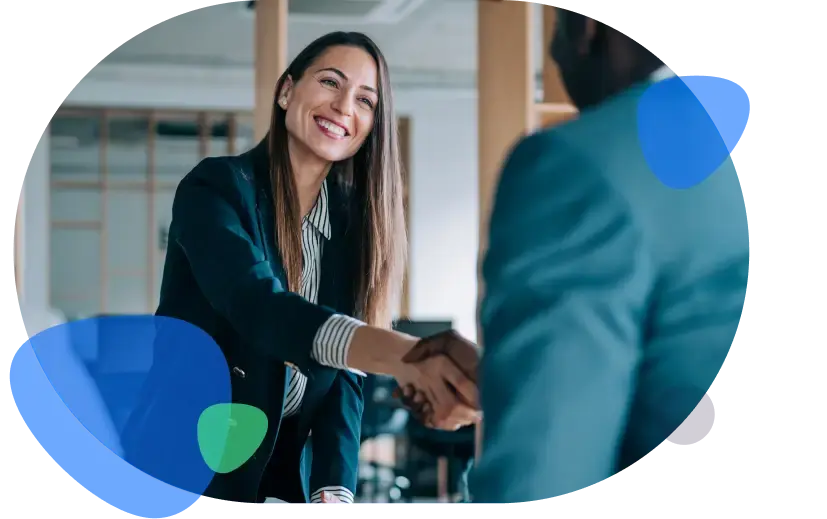 Woman shaking hands with Paystone partner