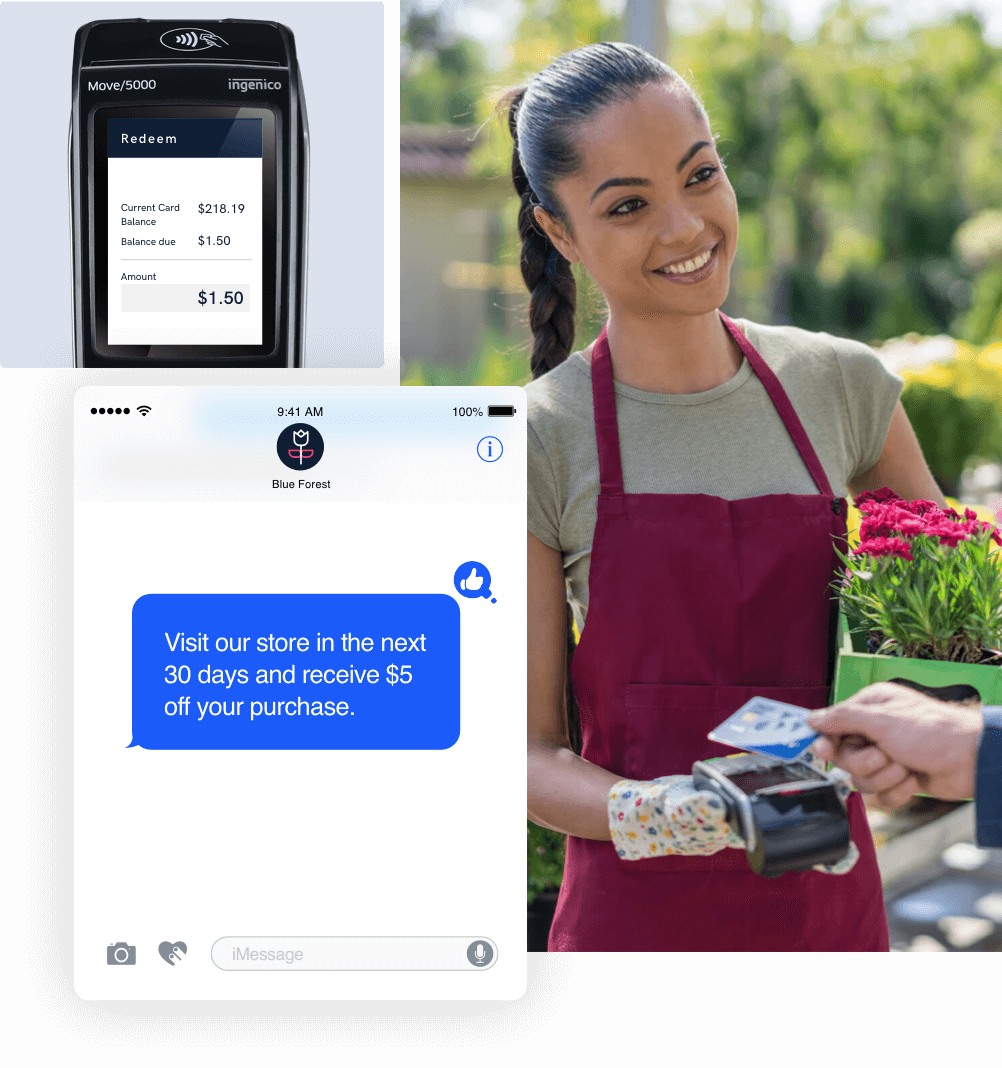 Flower shop employee accepting payment on debit machine