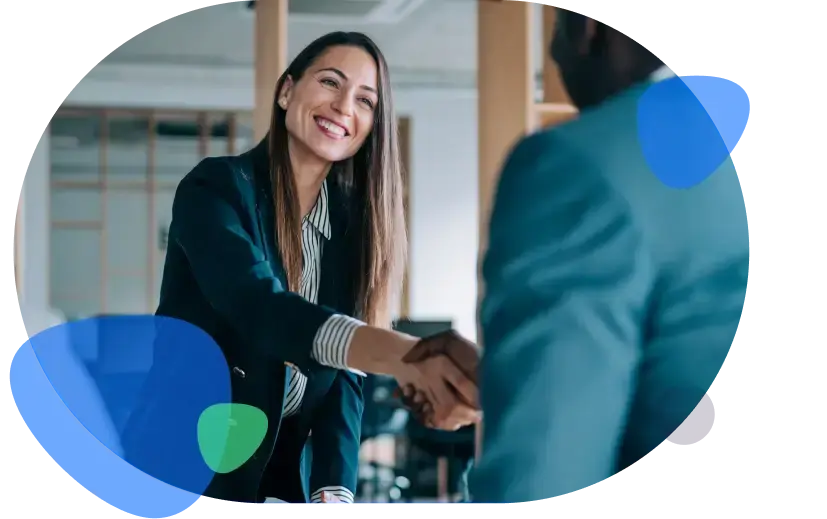 Woman shaking hands with Paystone partner