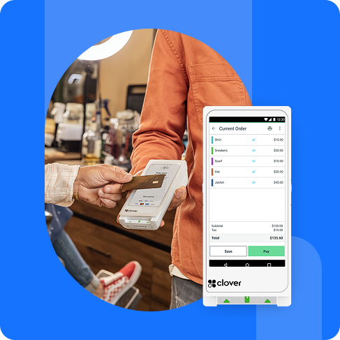 Business owner accepting payment using a Clover debit machine