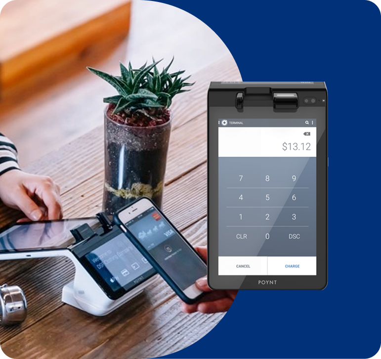 Small business owner accepting customer payment using a POS system
