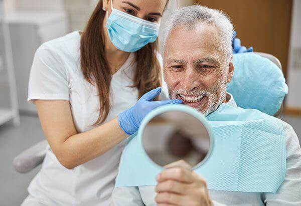 GAJ Denture Clinic’s owner sharing positive feedback about Paystone’s payment processing pricing and system